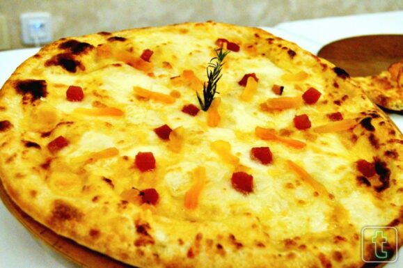 Queso manchego y solidaridad se unen en la nueva pizza de Marquinetti