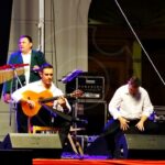 El Festival de Coros Rocieros llena la Plaza de España