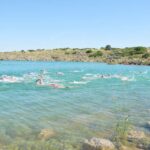 Más de 200 nadadores participan en el II Campeonato de Castilla-La Mancha Open de aguas abiertas en Peñarroya